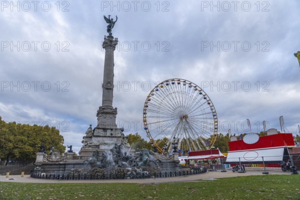 Bordeaux city, ferris wheel near monument aux girondins, a memorial to the girondists, a political