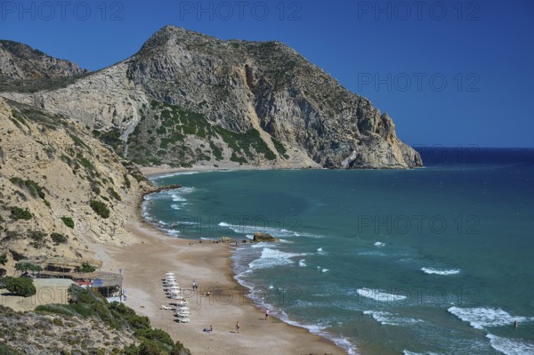 Beach, Kavo Paradiso, Paradise Beach, bay with sandy beach, surrounded by rocky coast and blue sea,