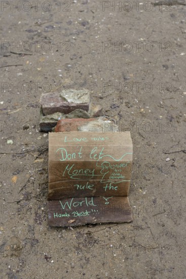 Protest sign in Hambach Forest, environmental activists protest against clearing for open-cast