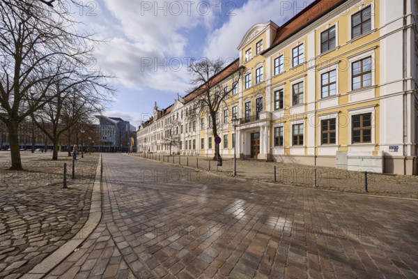 State parliament, historic houses, baroque architectural style, bollards, bare winter trees,