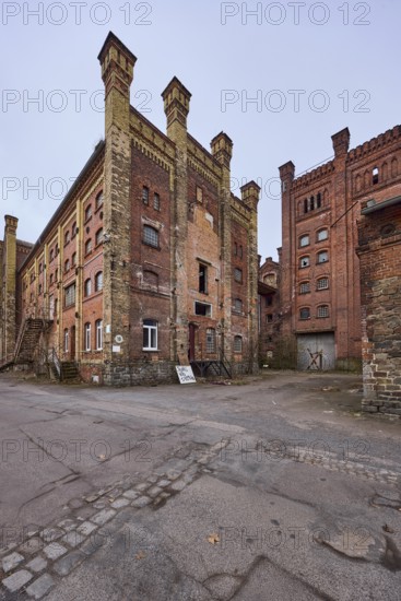 Old Diamant Brewery, brick building, historic brewery, ruin of a factory, diffuse light, cloudy,