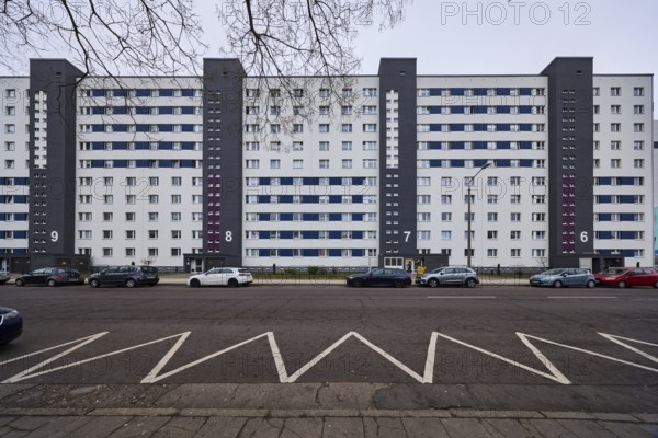 High-rise building, residential building, residential silo, façade with windows, colour line