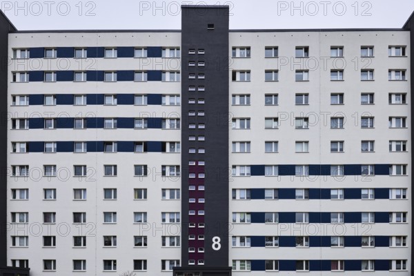 Residential building, high-rise building, residential silo, façade with windows, diffuse light,