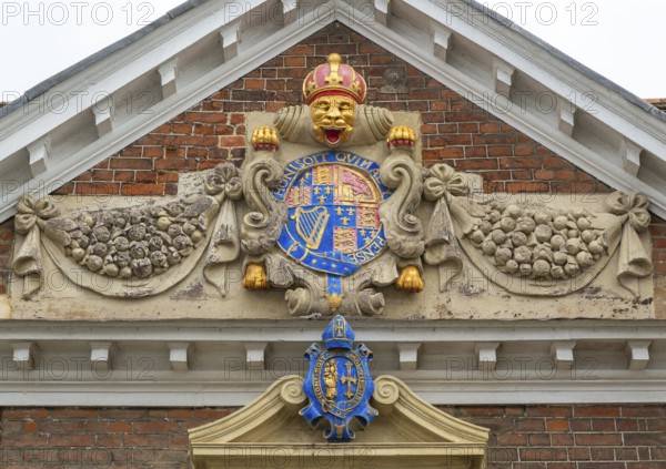 Royal Coat of Arms architectural detail, College of Matrons building, Salisbury, Wiltshire,