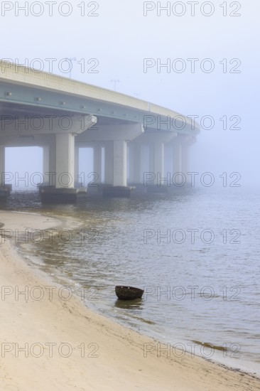 US Highway 90 bridge over the Biloxi Bay disappears into the dense fog at Ocean Springs,