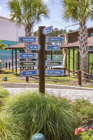 Sign directs guests to different attractions at Ocean Adventures Marine Park in Gulfport,