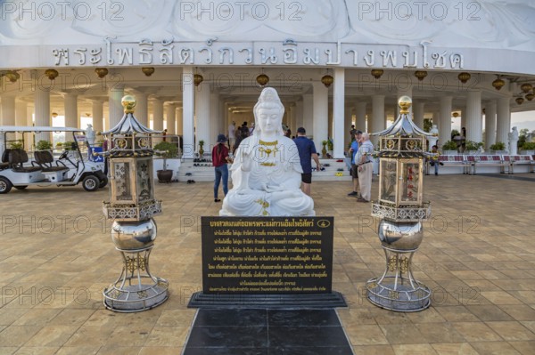 Buddhist shrine at the base of the Guan Yin (Goddess of Mercy) statue at Wat Huay Pla Kang Temple