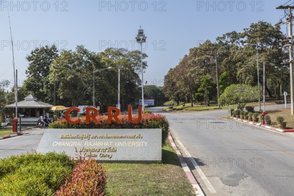 Sign at main gate entrance to CRRU Shiangrai Rajabhat University in Chiang Rai, Thailand