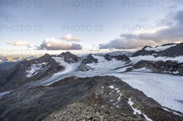 Sunset at the summit of the Becher, picturesque high mountain landscape, view of mountain peaks