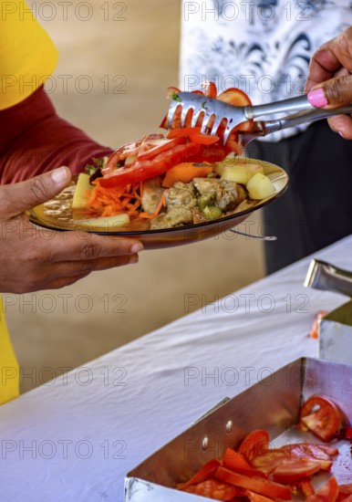 Typical Brazilian food being served in a popular restaurant for the local low-income population,