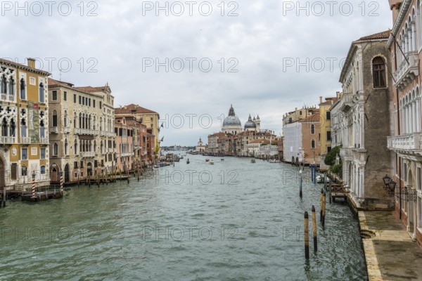 Scenic view of the grand canal flowing through venice, showcasing colorful historic buildings and