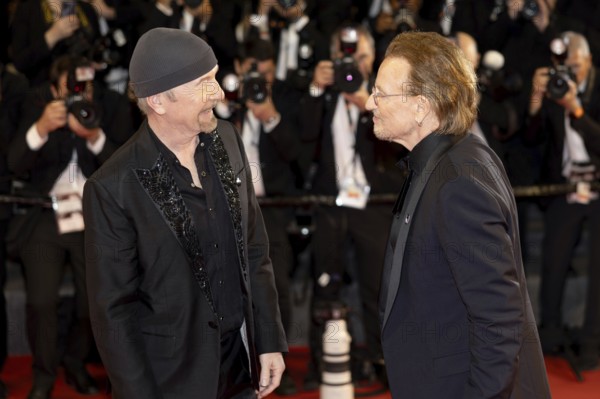 Cannes, France - 16.5.2024: The Edge and Bono on the red carpet during the 78th Cannes