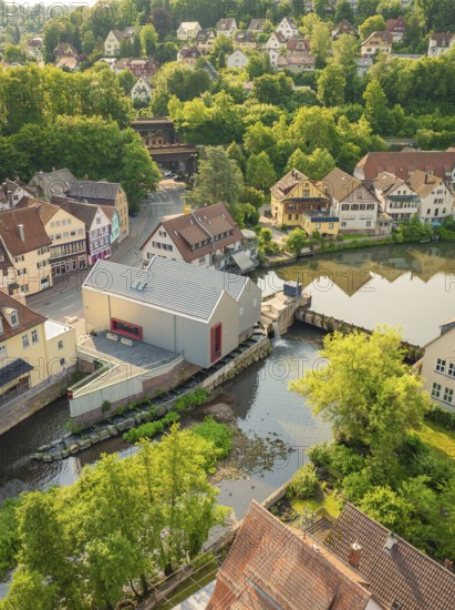 Town view with river and green nature, surrounded by half-timbered houses and trees, Calw, Black