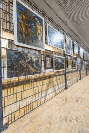 Gallery wall with various paintings in a modern art gallery ambience, historical art exhibition in