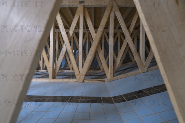Wooden construction with geometric pattern and blue and white tiles, historical art exhibition in