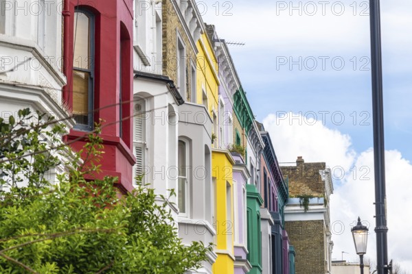 Traditional terraced houses showcasing a vibrant array of colors in the charming neighborhood of