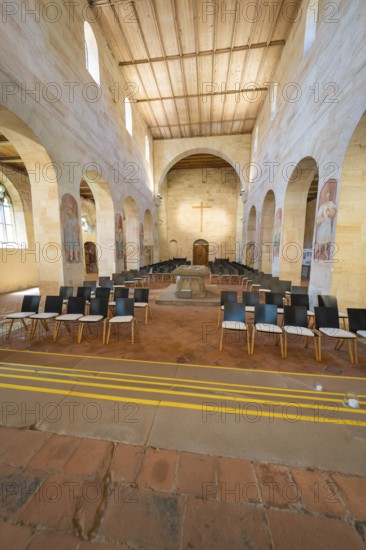 Church interior with organised pews and a central cross, event and wedding location Lorch