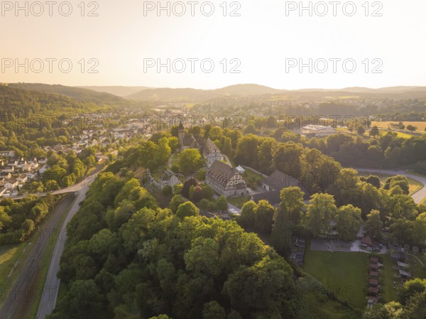 Sweeping views of a village and landscape at sunset, event and wedding location Lorch Monastery,