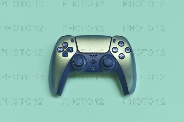 Germany - May 2025: Sony DualSense Wireless Playstation 5 Controller in Chroma Teal color on