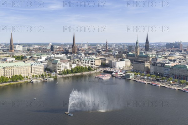 Aerial view of the Inner Alster with Jungfernstieg and Alster fountain against a blue sky, Hamburg,