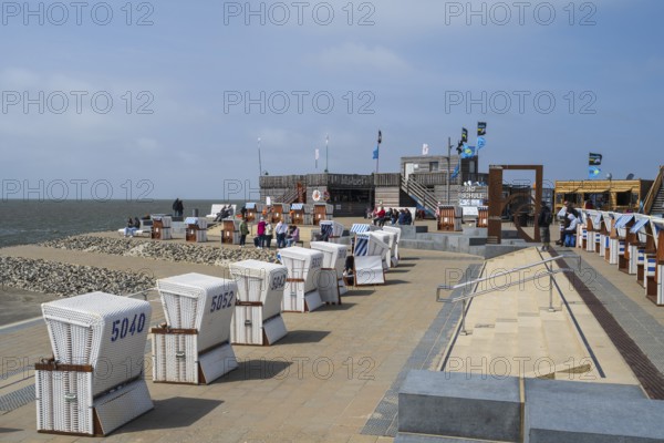 Beach chairs on the promenade, family lagoon, Perlebucht, Büsum, North Sea, Schleswig-Holstein,