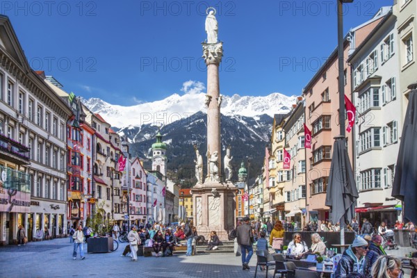 Pedestrian zone Maria-Theresien-Strasse with the Annasäule in front of the Nordkette of the