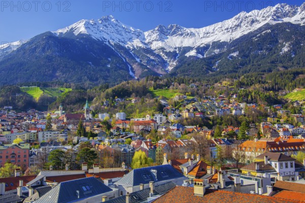 City view with the Hungerburg district in front of the Nordkette from the Karwendel Mountains,