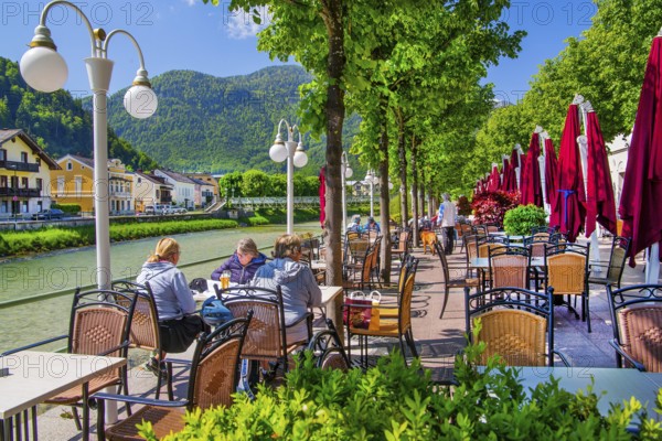 Café terrace of the GranCafe Zauner on the banks of the Traun, Bad Ischl, Trauntal, Salzkammergut,
