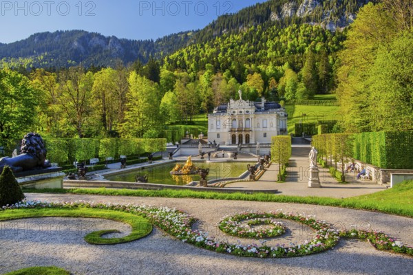 Water parterre with the portal of Linderhof Castle in spring, municipality of Ettal, Ammergau Alps,