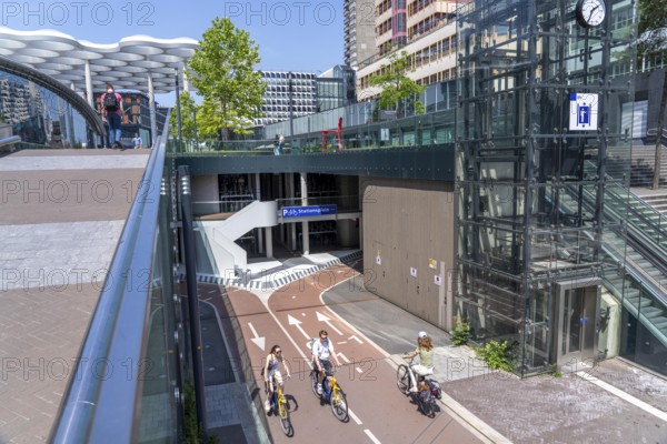 Entrance and exit to the central bicycle car park at Stationsplein, the largest bicycle car park in