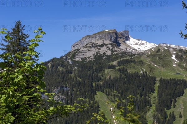 Striking mountain range of the Hohe Ifen and its Gottesacker plateau with snow in spring,