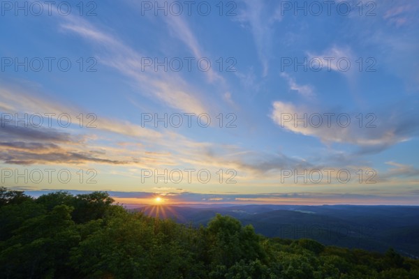 Sunset with soft colours in the sky over wooded area, Katzenbuckel, Waldbrunn,