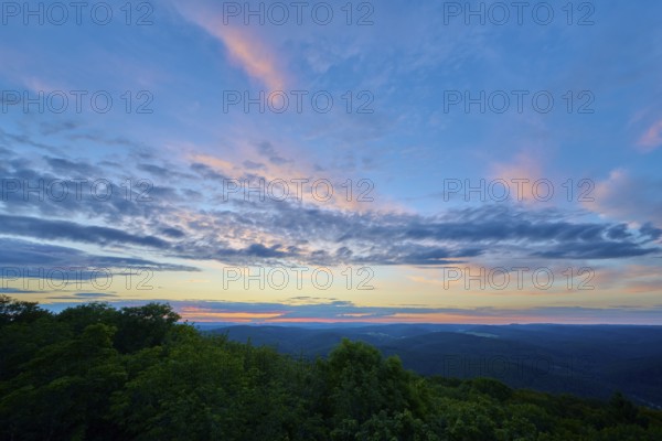 Twilight with pastel-coloured clouds over a green landscape, Katzenbuckel, Waldbrunn,