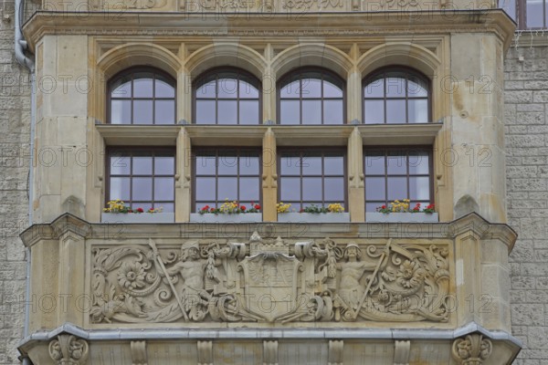 Portal with city coat of arms, town hall built in 1901, decorations, windows, Dessau,