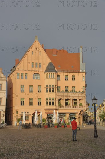 Historic building built in 1908 on the market square, mood lighting, pedestrian, Luther city