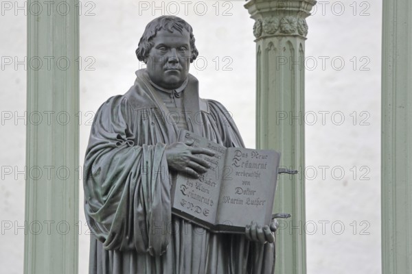 Luther monument with Bible and New Testament, Martin Luther, inscription, hands, carry, open, open,