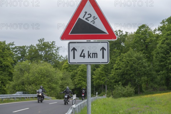 Road sign Gradient, gradient 12 per cent, length 4km, GEO nature park Park Frau Holle Land am