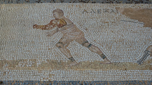 Ancient mosaic of a running man in Greek style, Archaeological Site, Western Excavation, Kos Town,