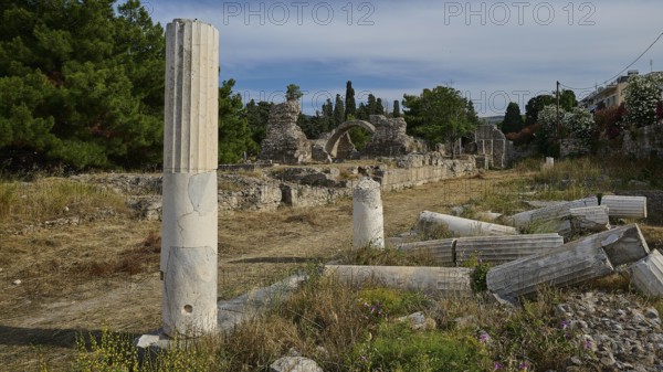 Roman or Greek ruins with scattered ancient columns in a landscape, Hall of Columns Xysto,