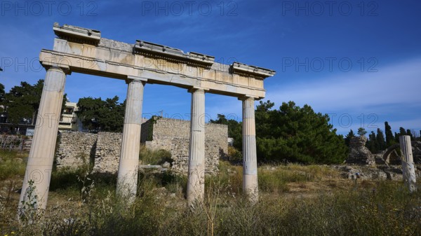 Ruins of an ancient temple with columns in a natural setting, Archaeological site, Xysto Columned