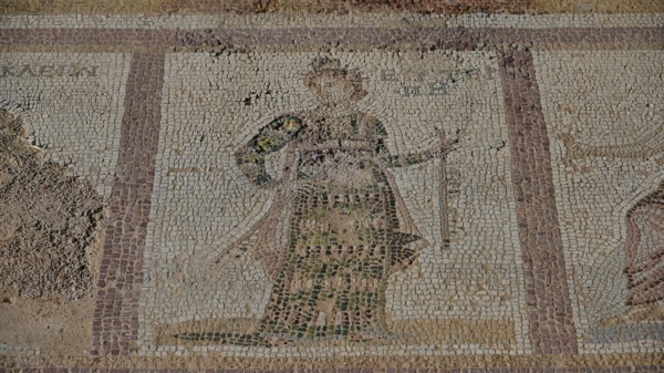 Ancient mosaic of a standing figure in a robe, partially damaged, Archaeological Site, Western