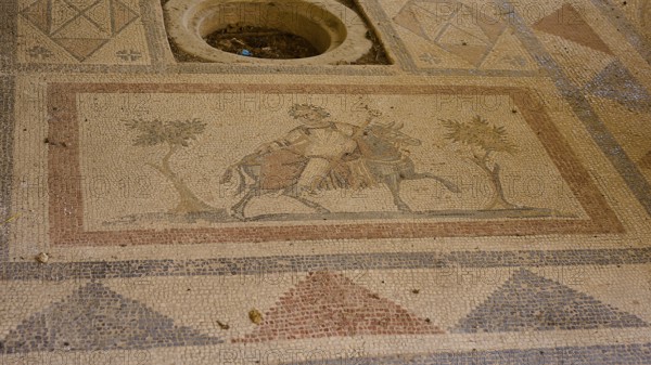 Ancient mosaic with figures and geometric patterns, showing people and a horse, Archaeological