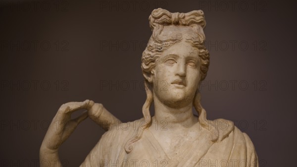 Close-up of the head of a sculpture depicting Artemis with typical hairstyle, Archaeological