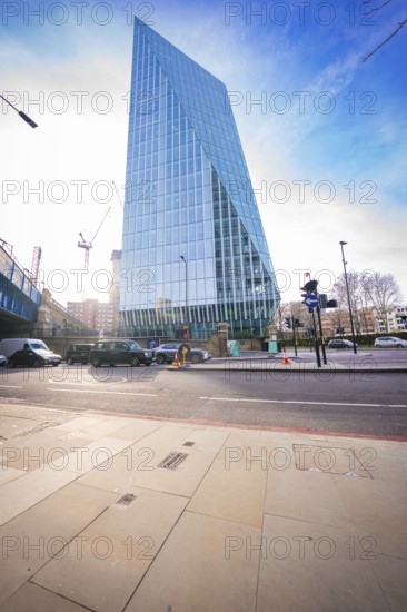 Modern glass building that stands out in the city for its unique architecture, London, United