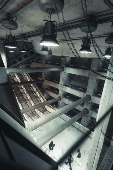 Futuristic space with industrial lamps and concrete architecture, Westminster Station, London,