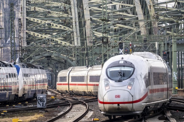 Rail track in front of Cologne Central Station, Hohenzollern Bridge across the Rhine, ICE