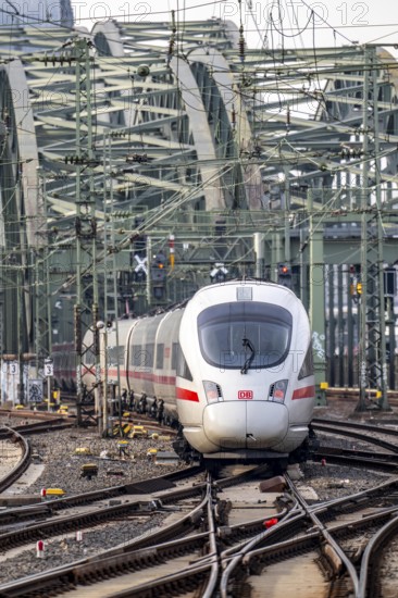 Rail track in front of Cologne Central Station, Hohenzollern Bridge across the Rhine, ICE