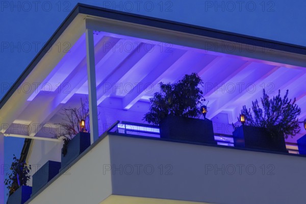 Modern roof terrace with atmospheric LED lighting in changing colors