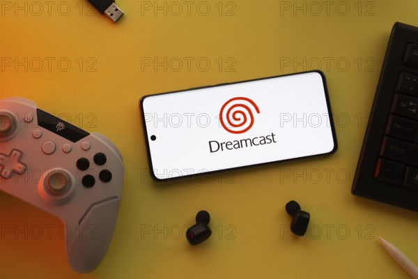 Dhaka, Bangladesh- 23 March 2025: Dreamcast logo displayed on a smartphone surrounded by gaming
