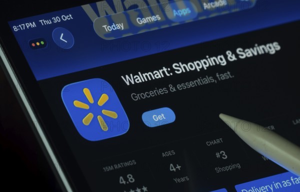 Dhaka, Bangladesh- 30 Oct 2025: Walmart app displayed on a iPad screen in dark mode with a digital